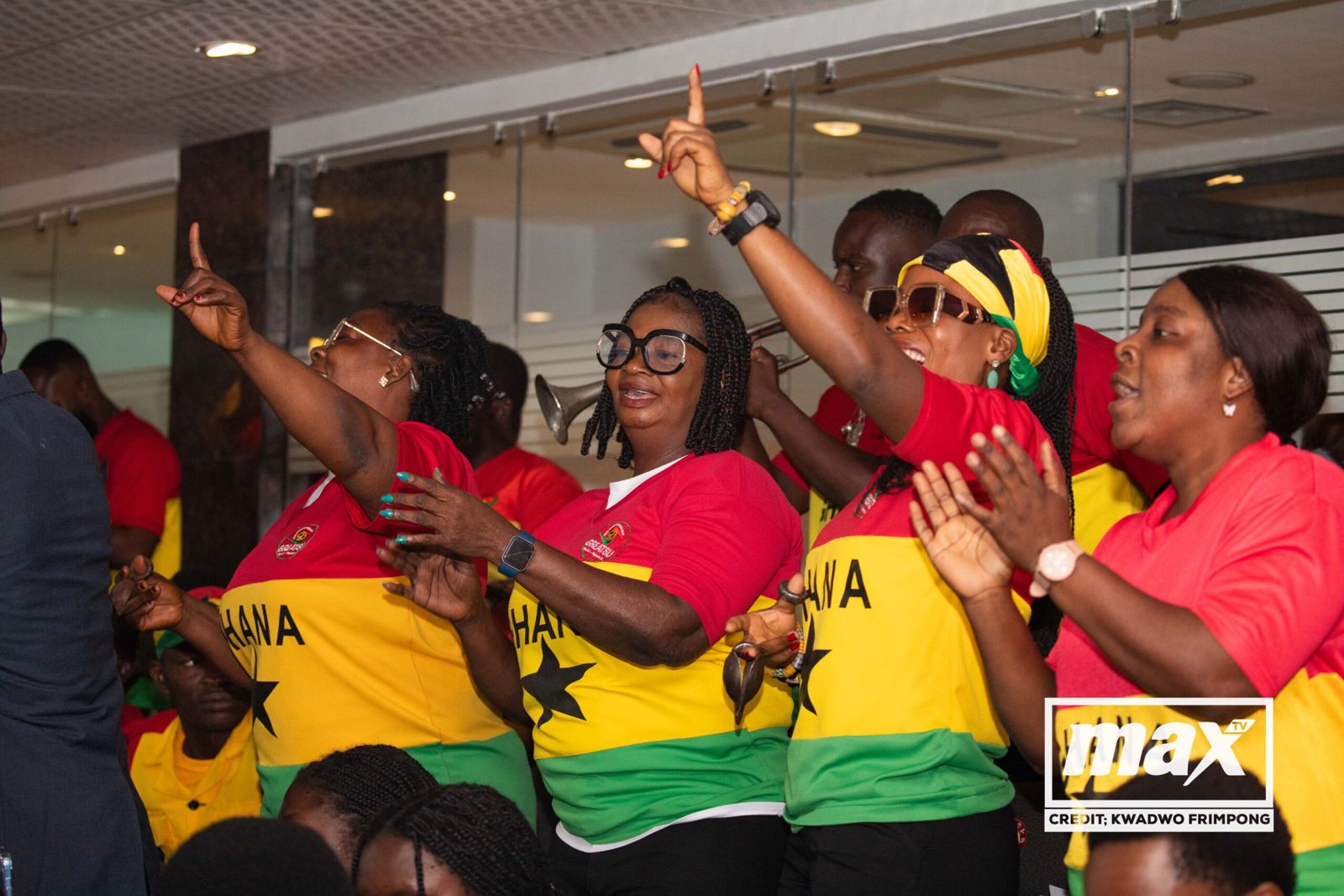 Supporters draped in Ghana flags at the launch