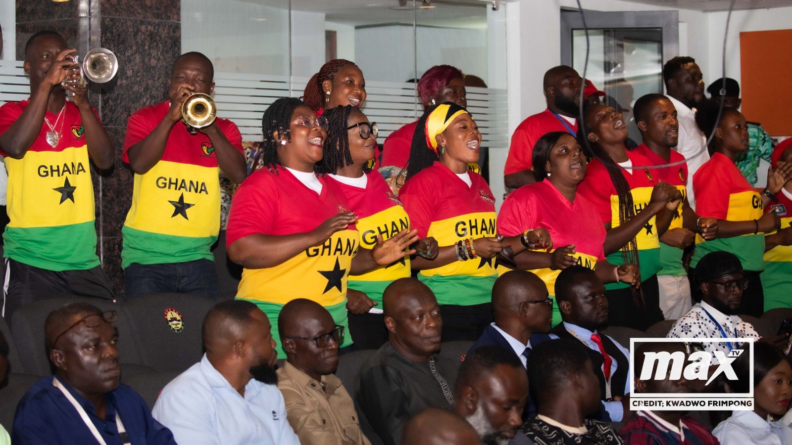Brass band in Ghana shirts performing